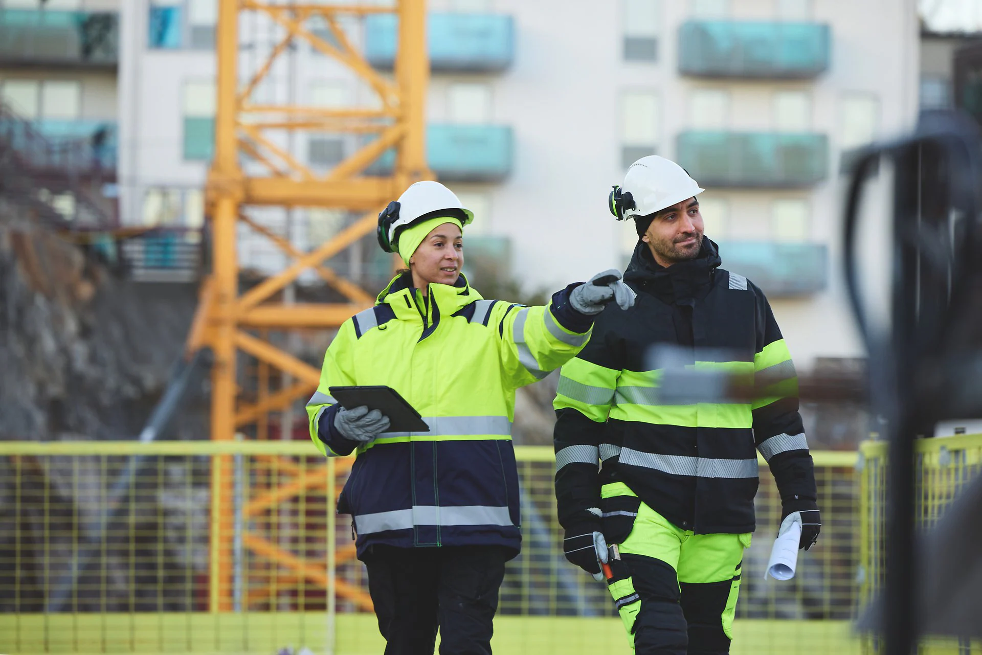 Project leaders reviewing construction documents